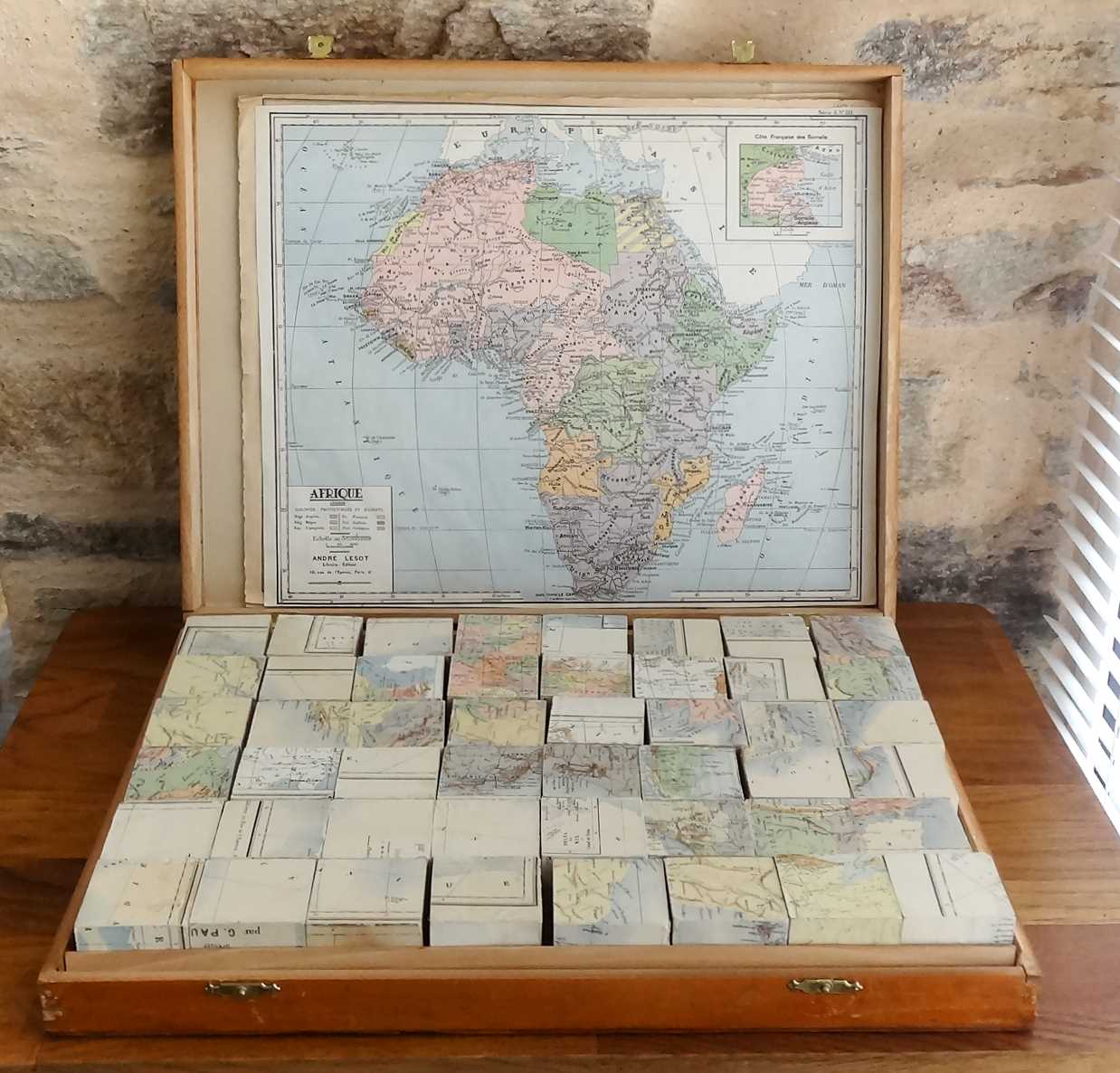 Old saussine geographical atlas in the form of a set of cubes around 1900