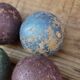 Four bowling balls
