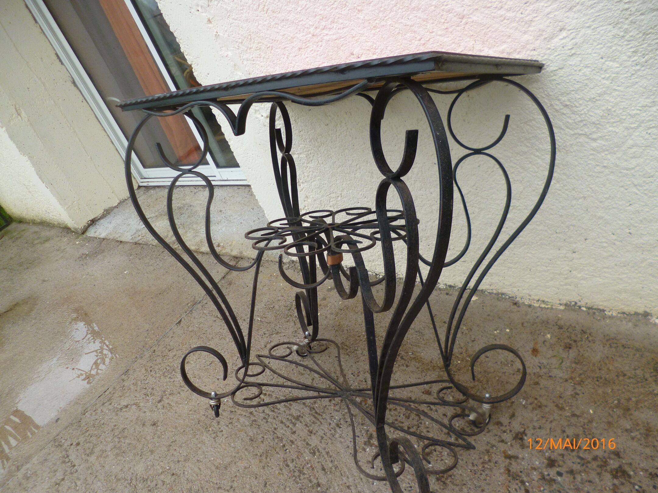 TV table roller iron forge style formica table