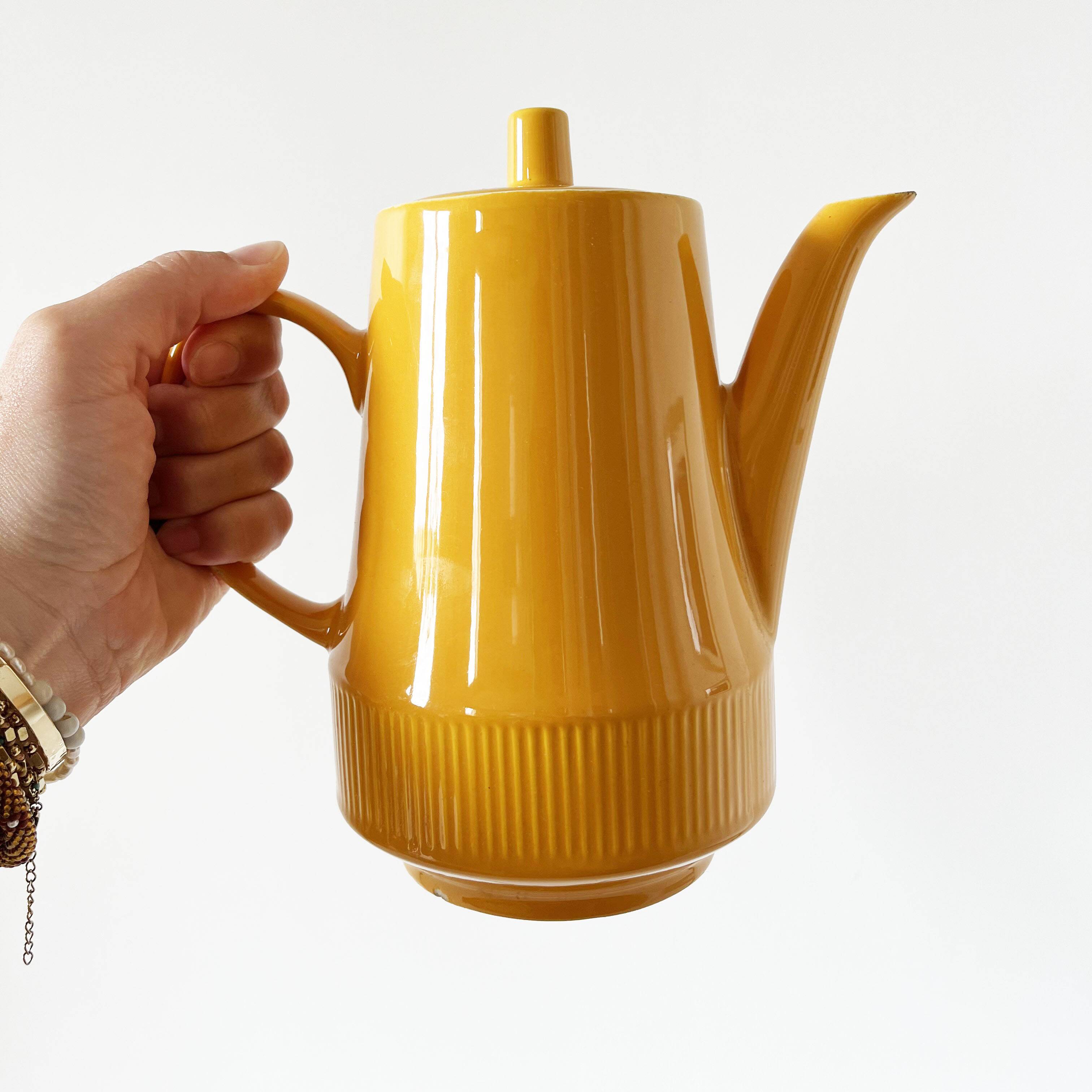 Old yellow ceramic coffee or teapot 1960