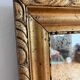 Antique French giltwood wall mirror in gold