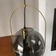 Suspension smoked glass and gilded metal