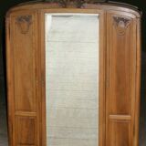 Majestic solid walnut wardrobe. Stamped work, late 19th century.