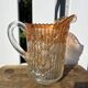 Pichet vintage Carnival Glass Marigold motifs roses –Années 1920-30