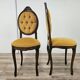 Pair of early 1900s wooden chairs with padded seat and backrests