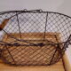 Duo of aged metal mesh baskets