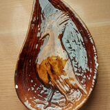 Empty pocket with vallauris bird decoration