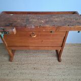 Vintage workbench with vices, antique workshop furniture.