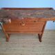 Vintage workbench with vices, antique workshop furniture.