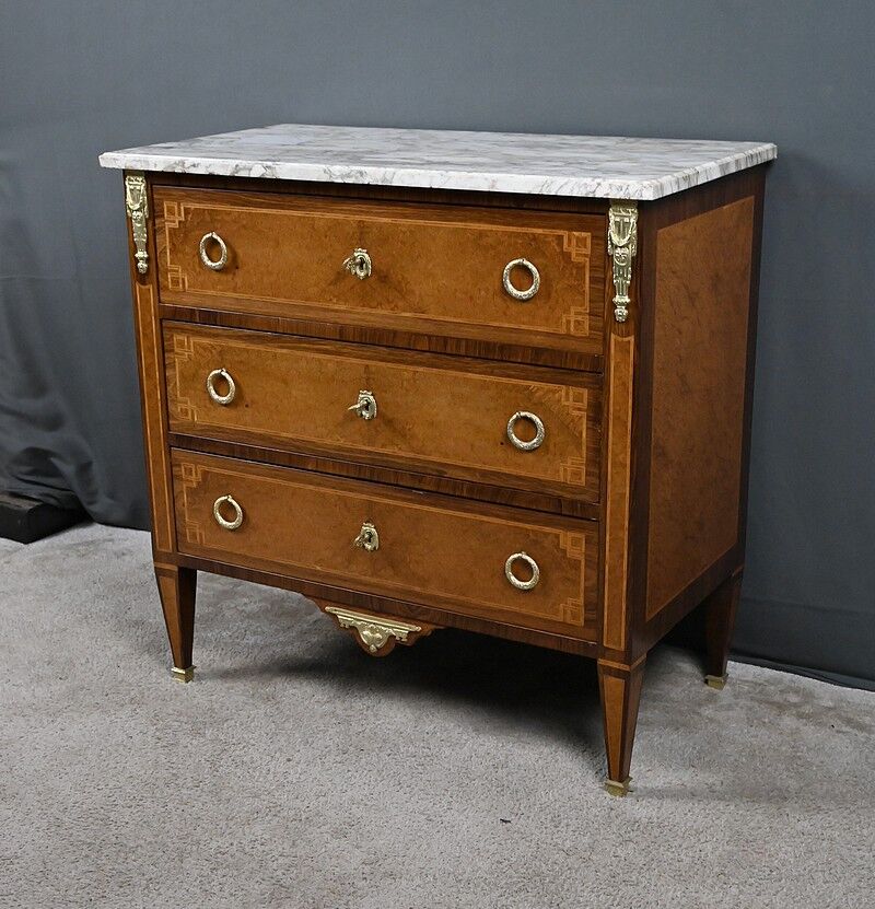 Small chest of drawers in amboyna and rosewood, Louis XVI style – 1940