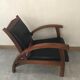 Teak armchair and black leather