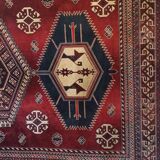 Wall rug with oriental patterns.