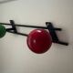Retro coat rack with 3 red and green balls