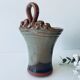 Wall-mounted or laying kitchen pot