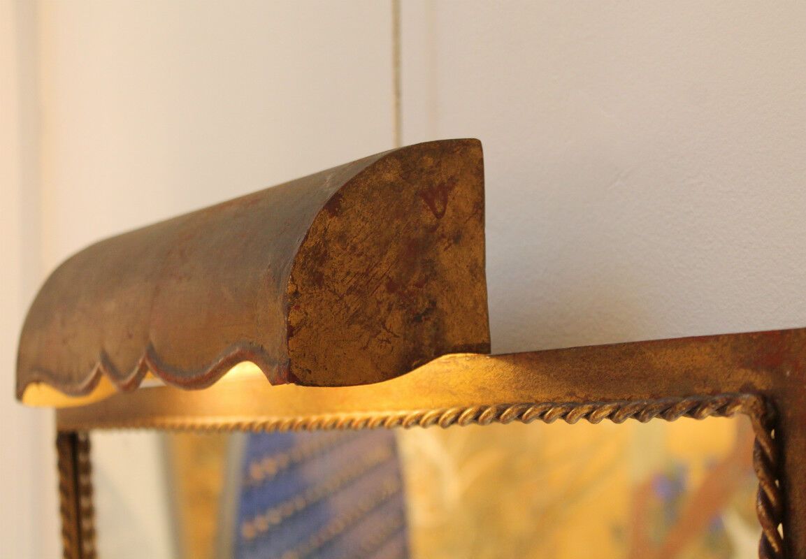Mirror lighting in gilded wrought iron