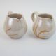 Pair of ceramic milk jugs signed La Roue Vallauris
