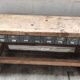 Old carpenter's workbench with eight metal drawers, industrial console