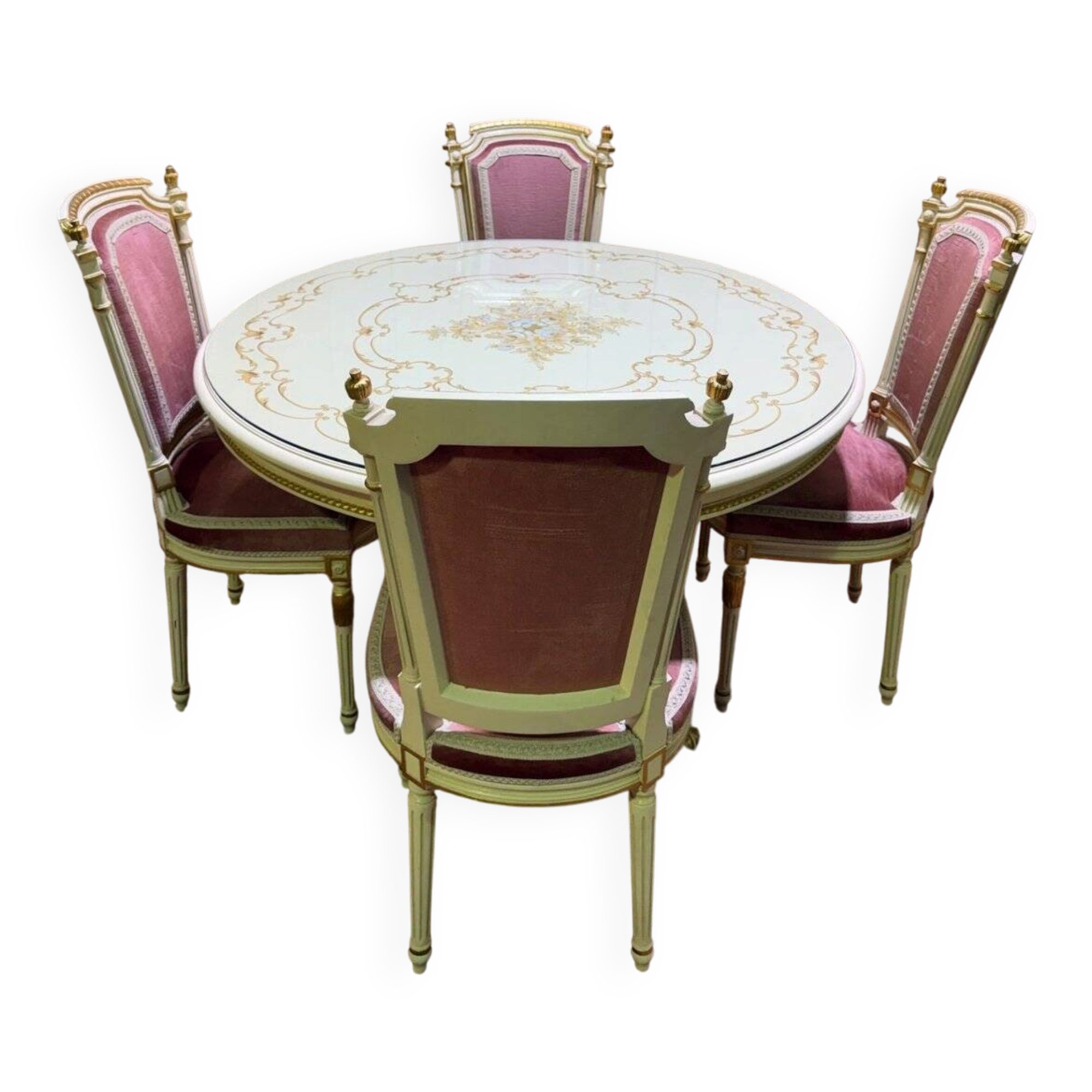 Louis XVI dining room table set with painted wood, gold accents, and pink velvet.