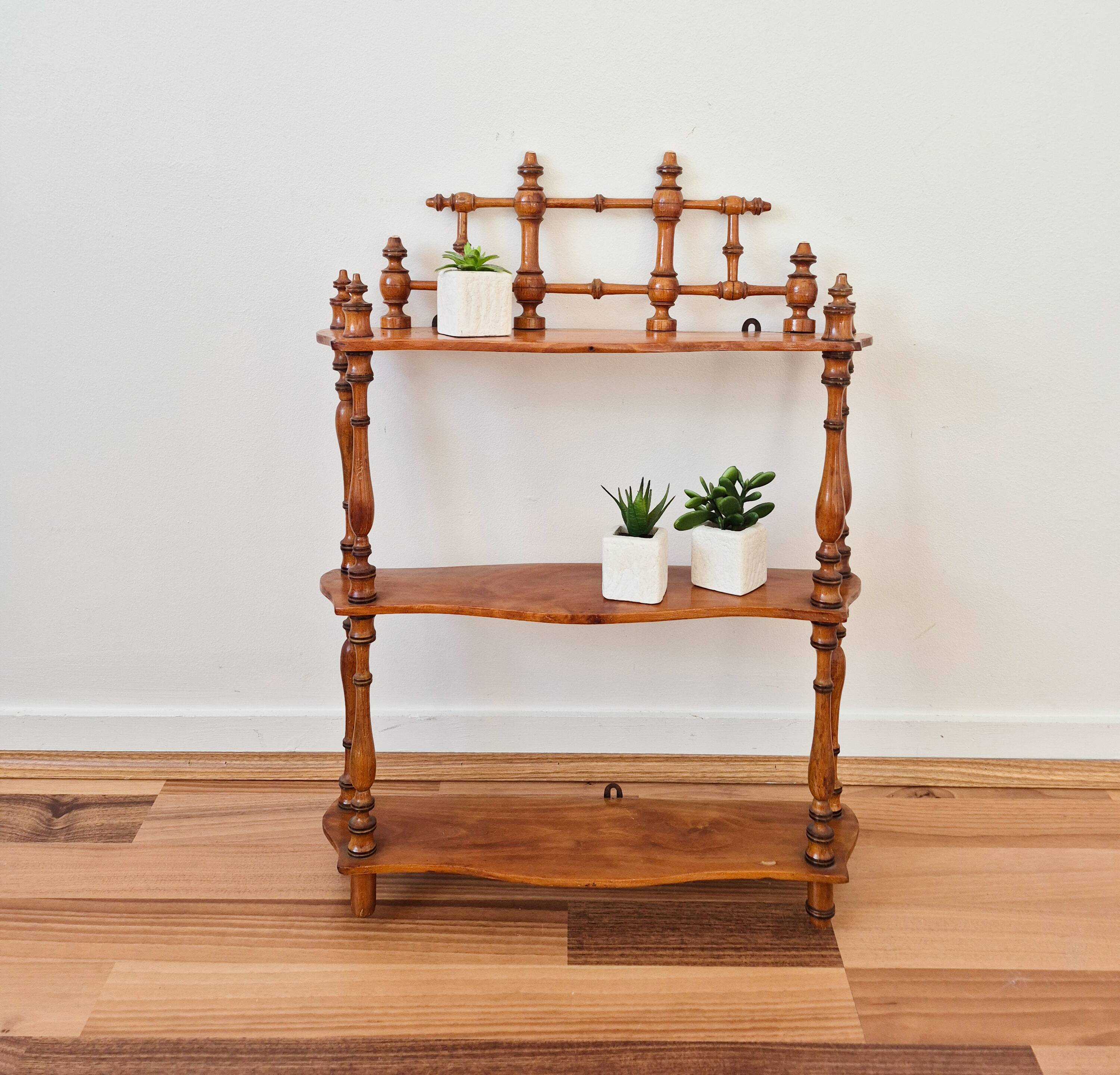 Waxed turned wooden shelf
