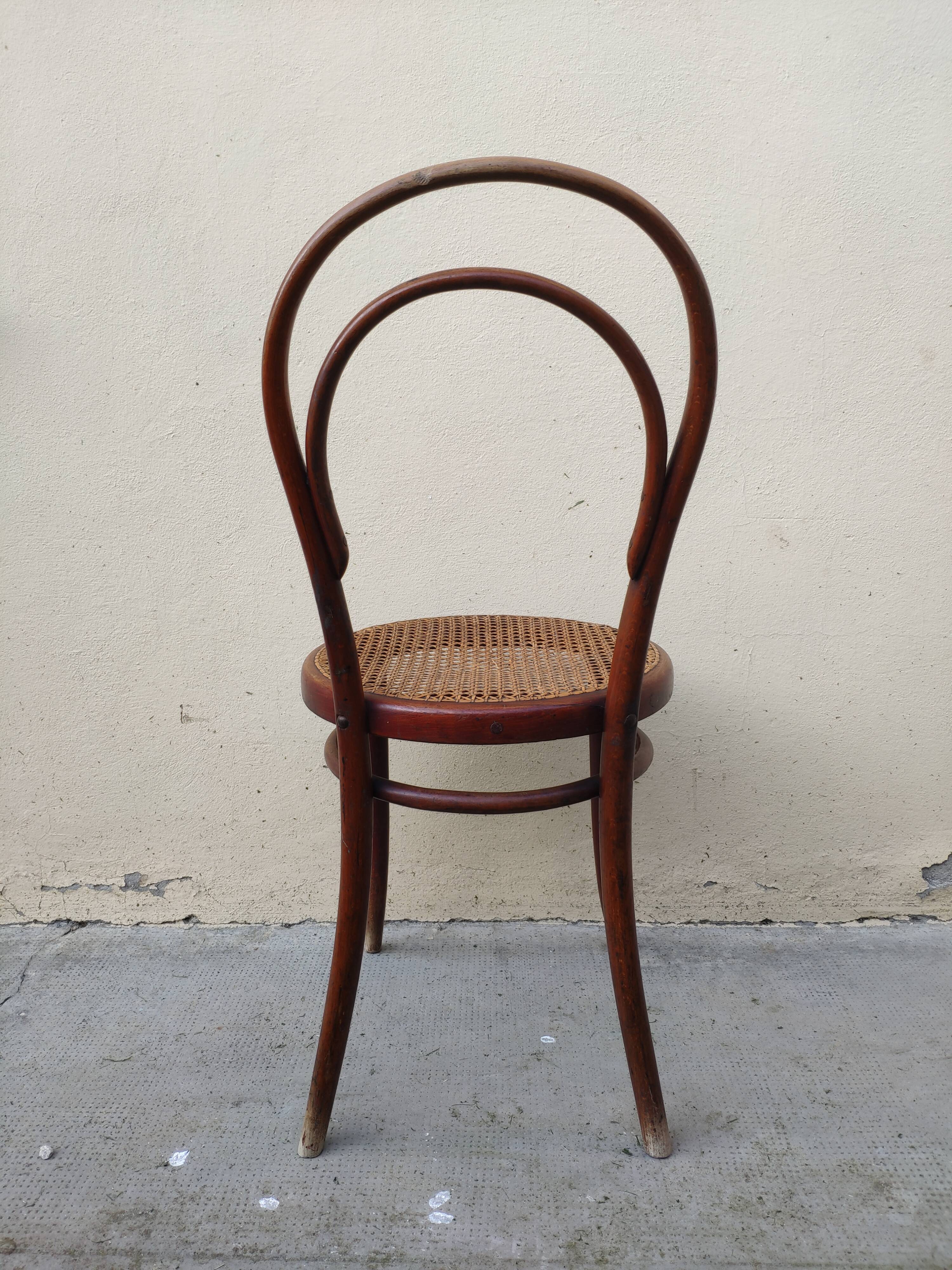 Pair of chairs Thonet n.  14 from 1861-1865, marked with a 1A label and a sun print