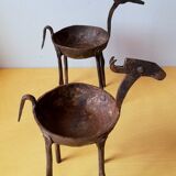 Zoomorphic wrought iron pocket emptier