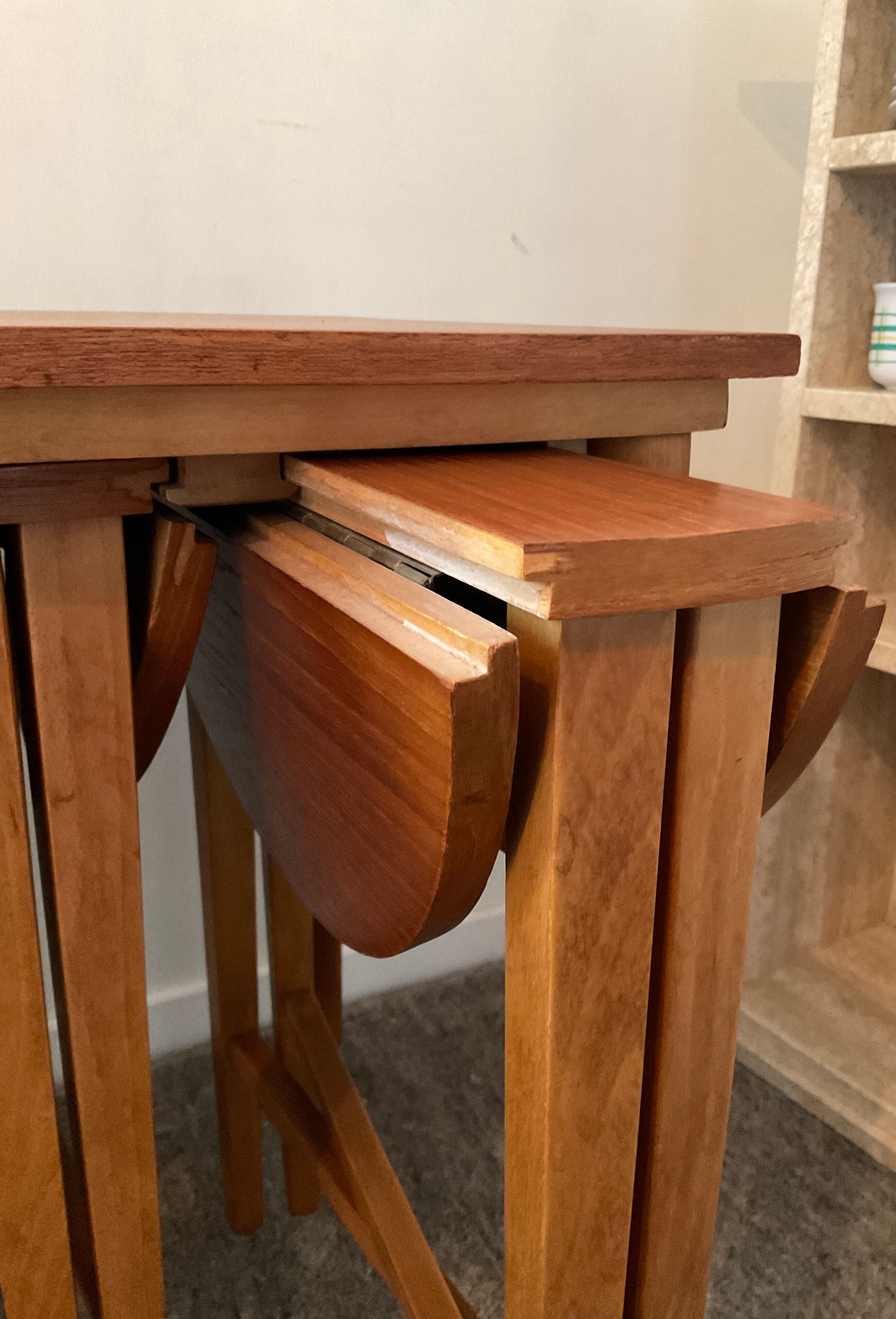 Scandinavian set by Poul Hundevad table and 4 folding teak stools