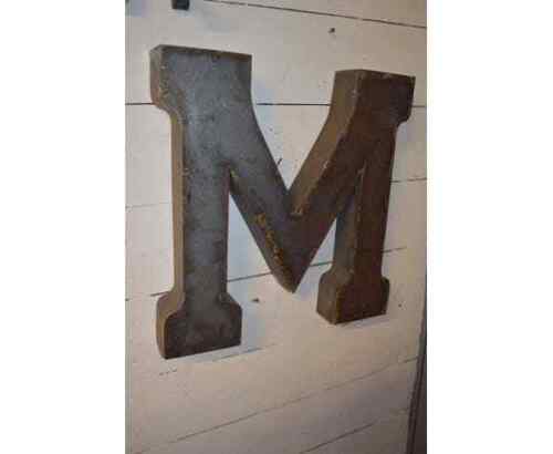 Industrial iron letter "M"