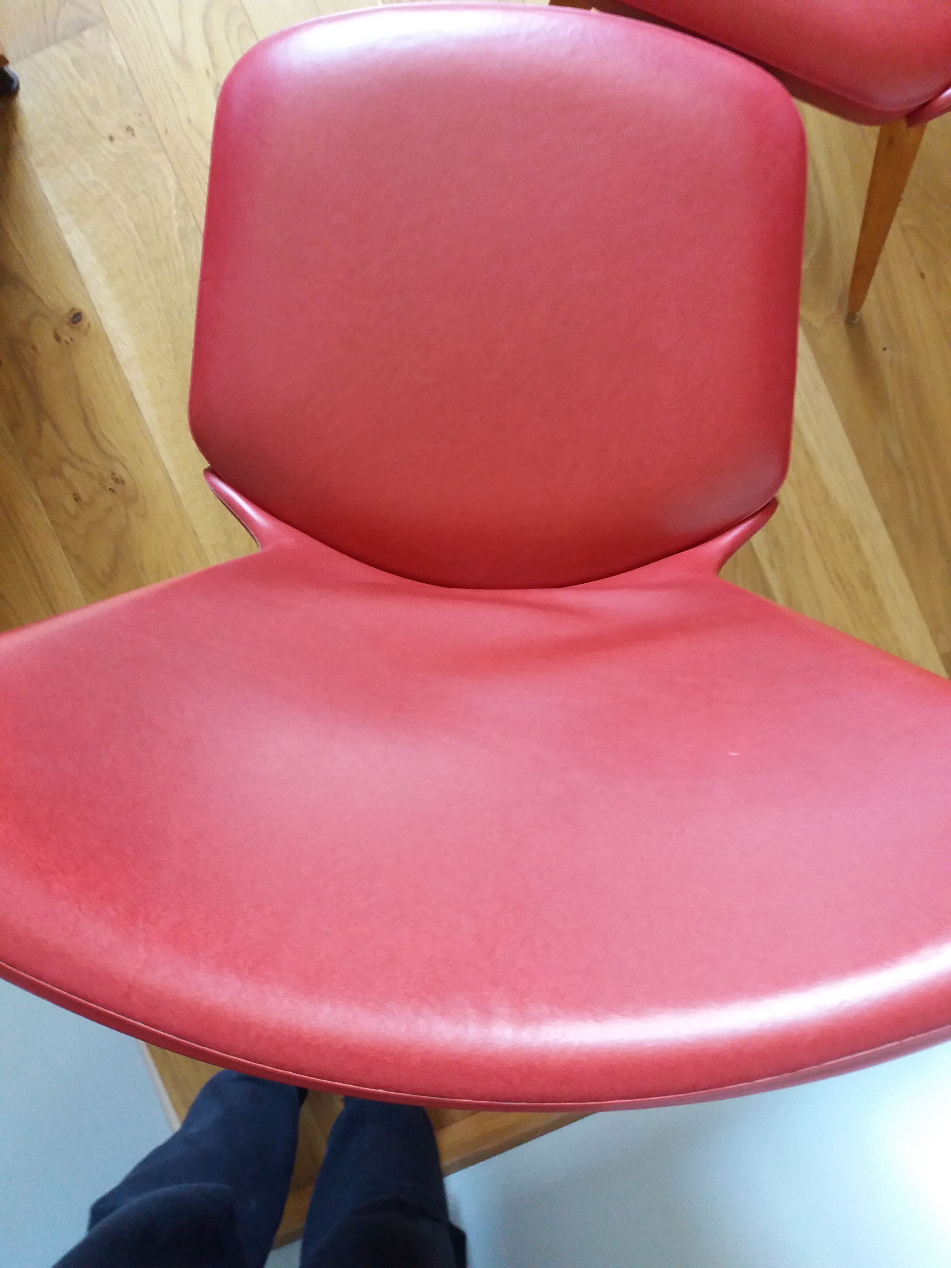 Baumann skai red imitation leather chairs from the 1950s