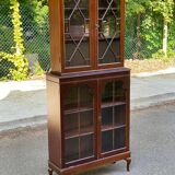 English display case with 2 wooden bodies