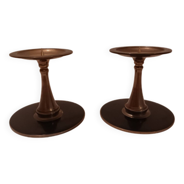 Pair of black brass candlesticks