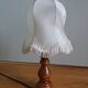 Turned wood lamp with fabric lampshade
