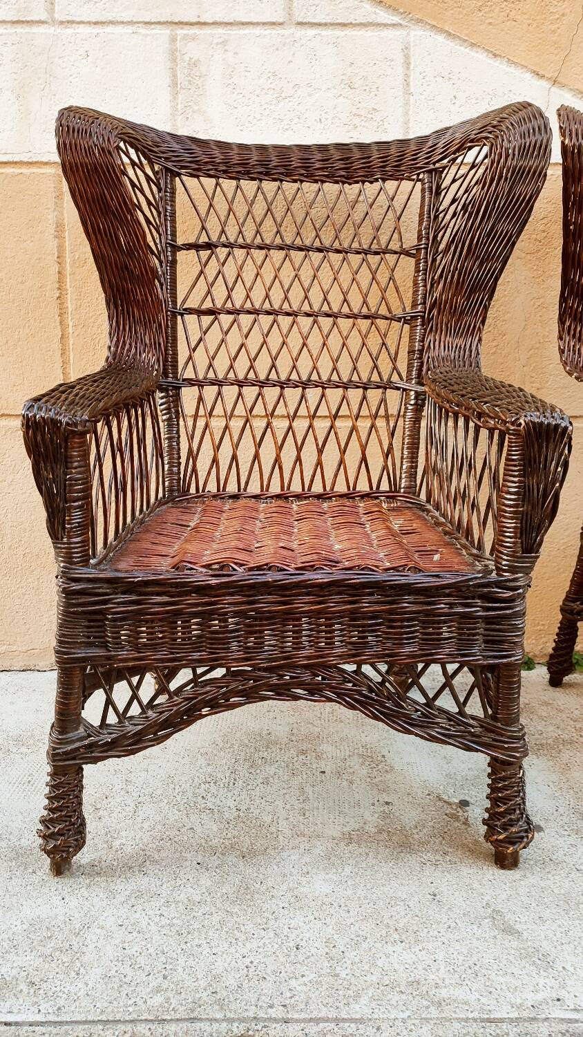Duo of rattan wing chairs