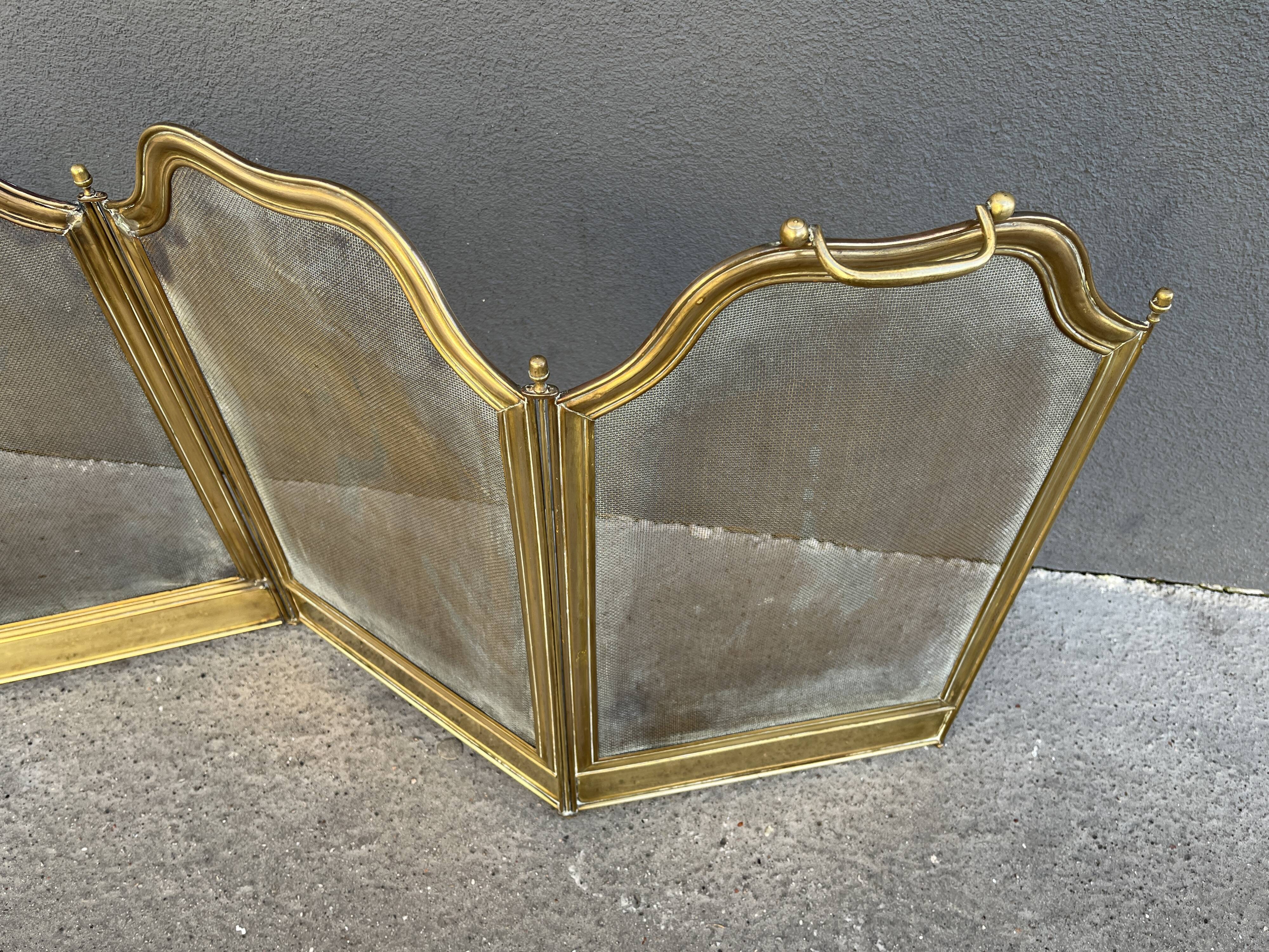 19th-century fireplace screen by Bouhon Frères in brass