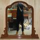 Vintage Art Deco decorative mirror with a thick frame.