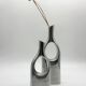 Pair of "drop" vases in aluminium cast, Italy, 1970s