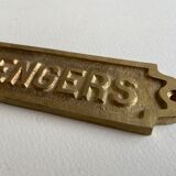 "Passengers" gold brass plate