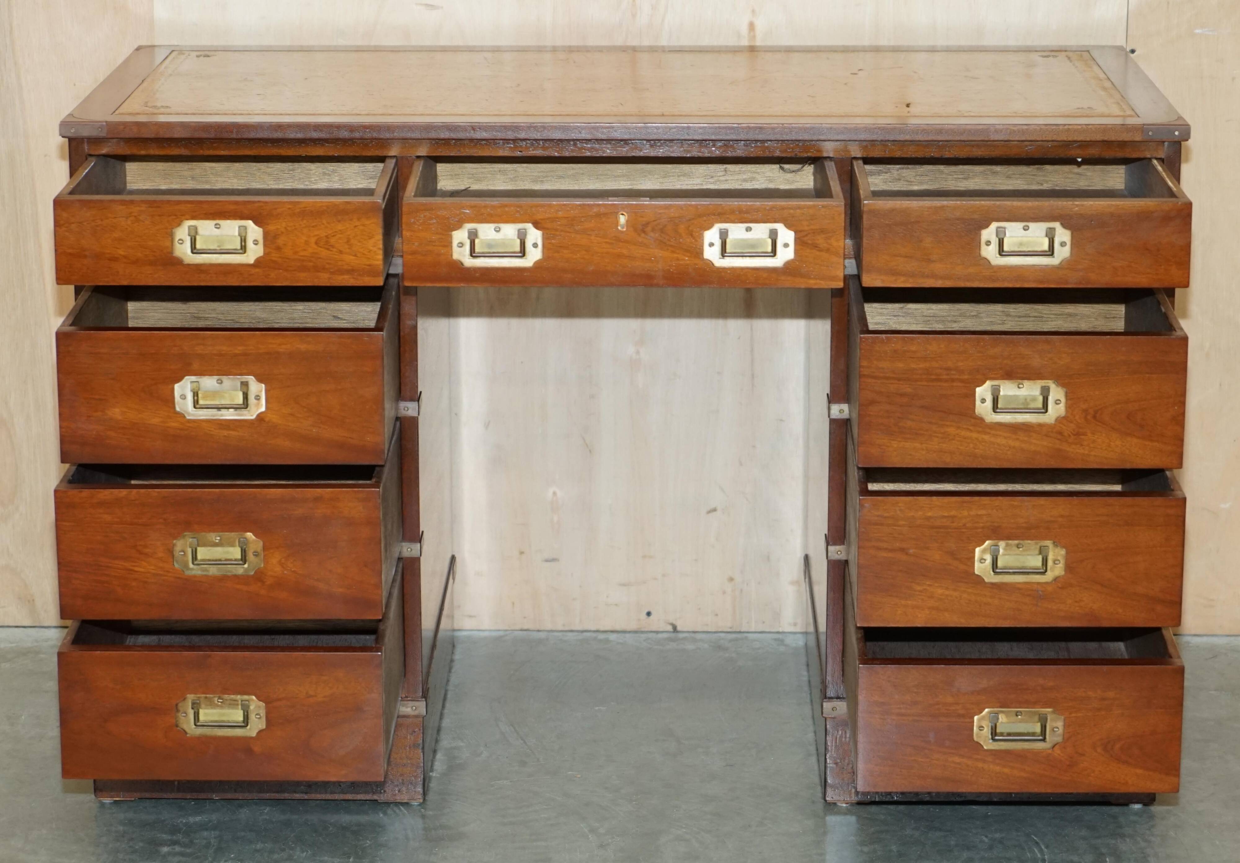 Vintage Harrods Kennedy desk in military campaign style with drawers.