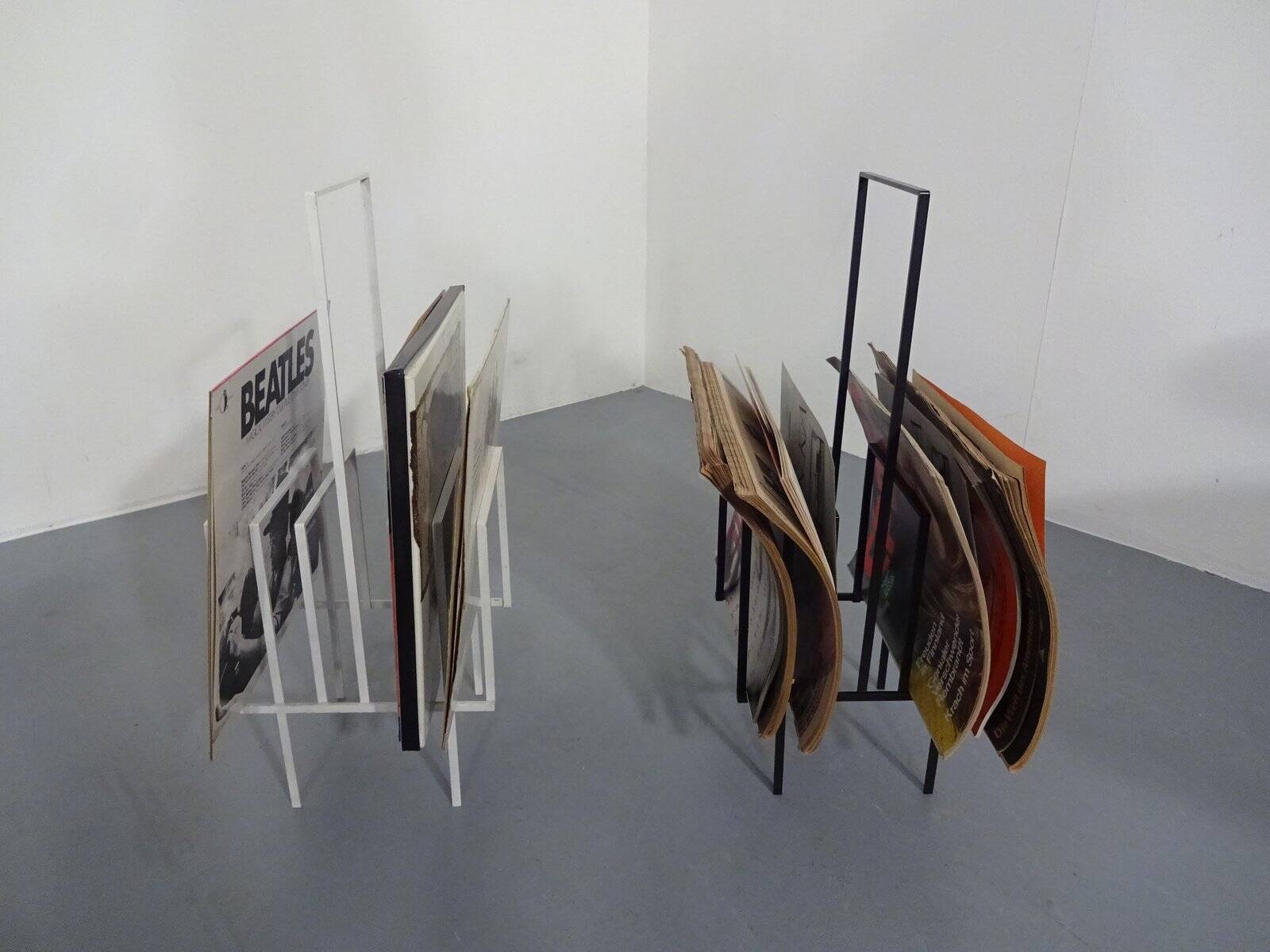 Steel magazine or record racks, 1960s, set of 2