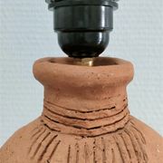 Anthropomorphic lamp foot depicting two faces terracotta design 80s