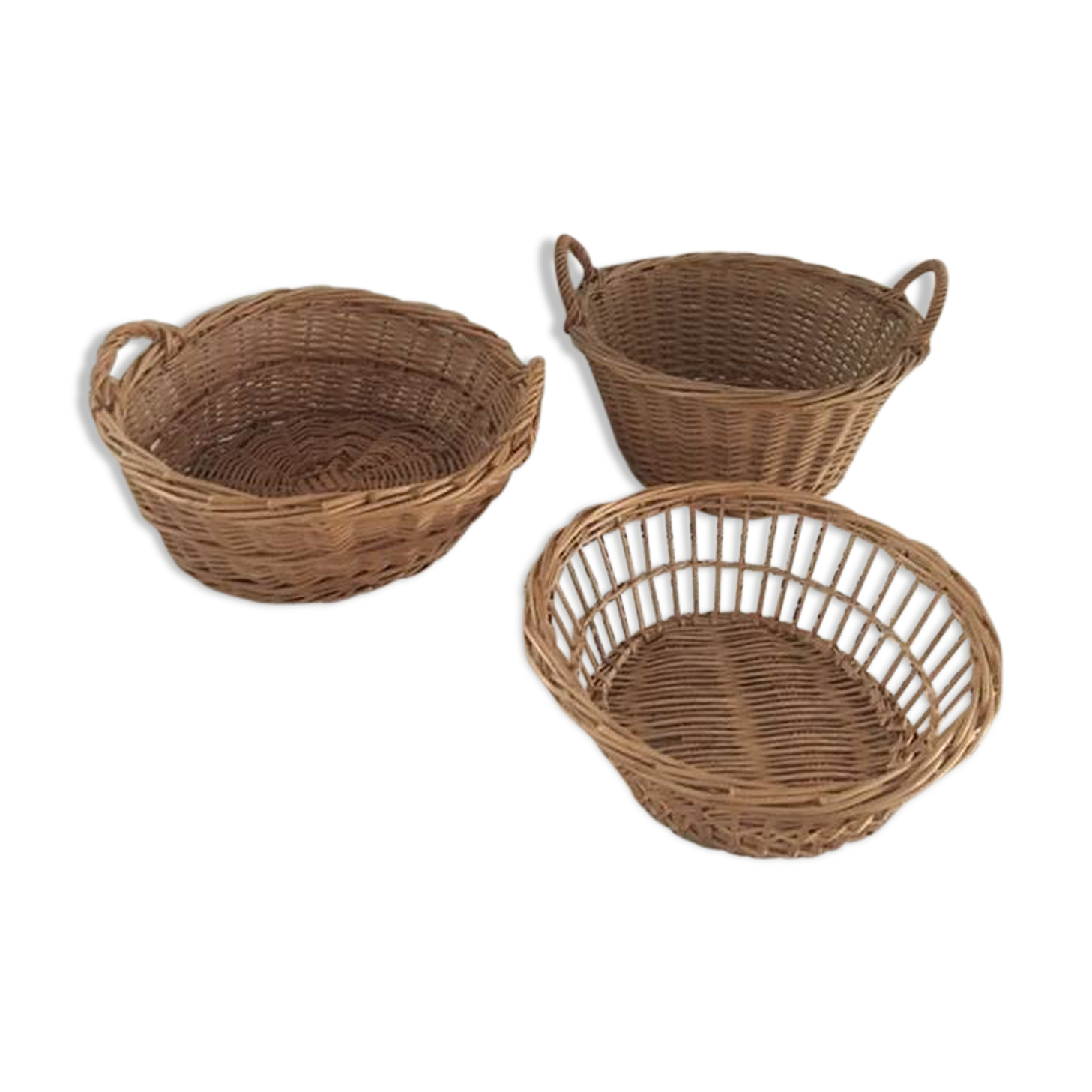 Three natural wicker baskets