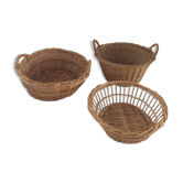 Three natural wicker baskets