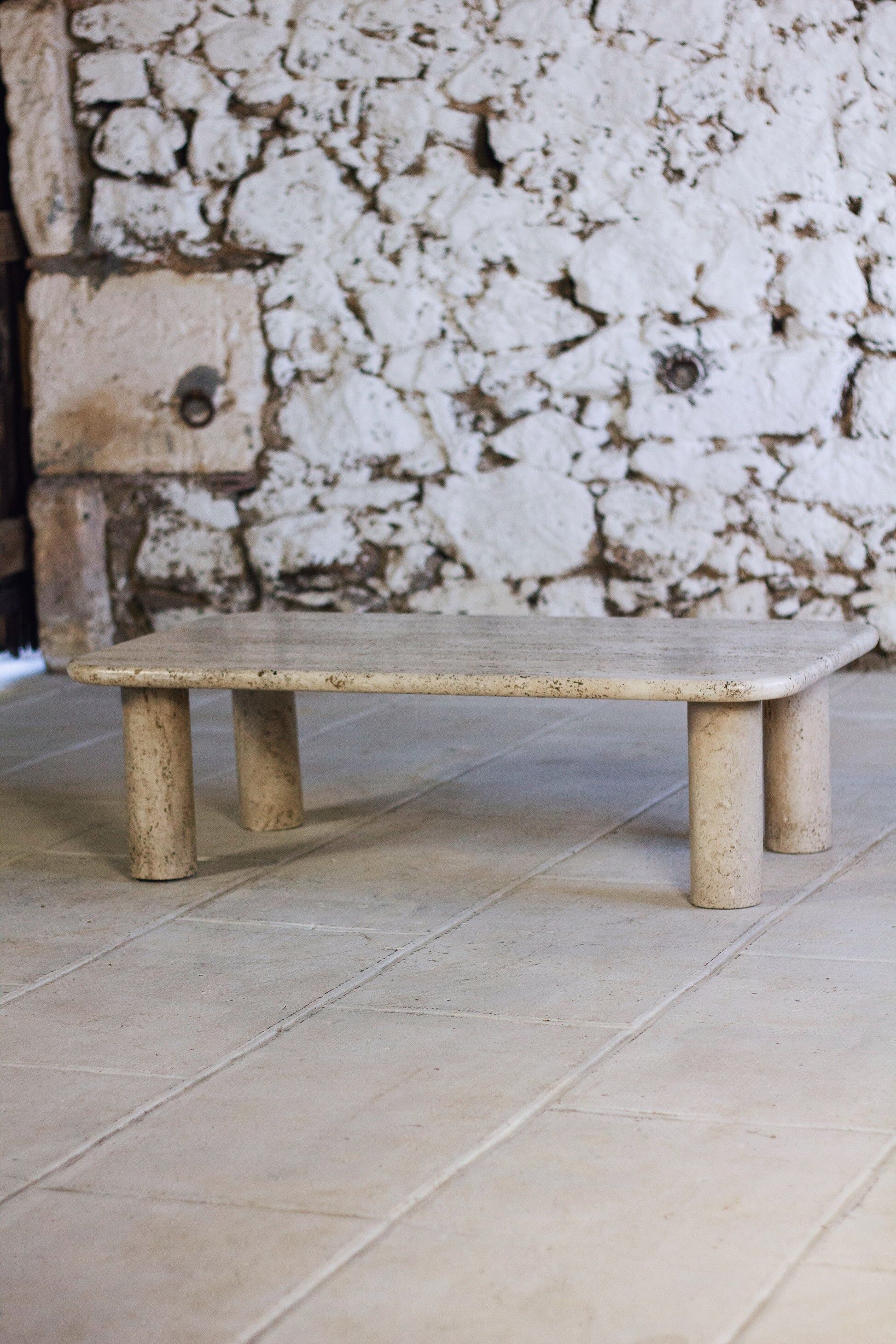Travertine coffee table in the style of Angelo Mangiarotti, 1970.