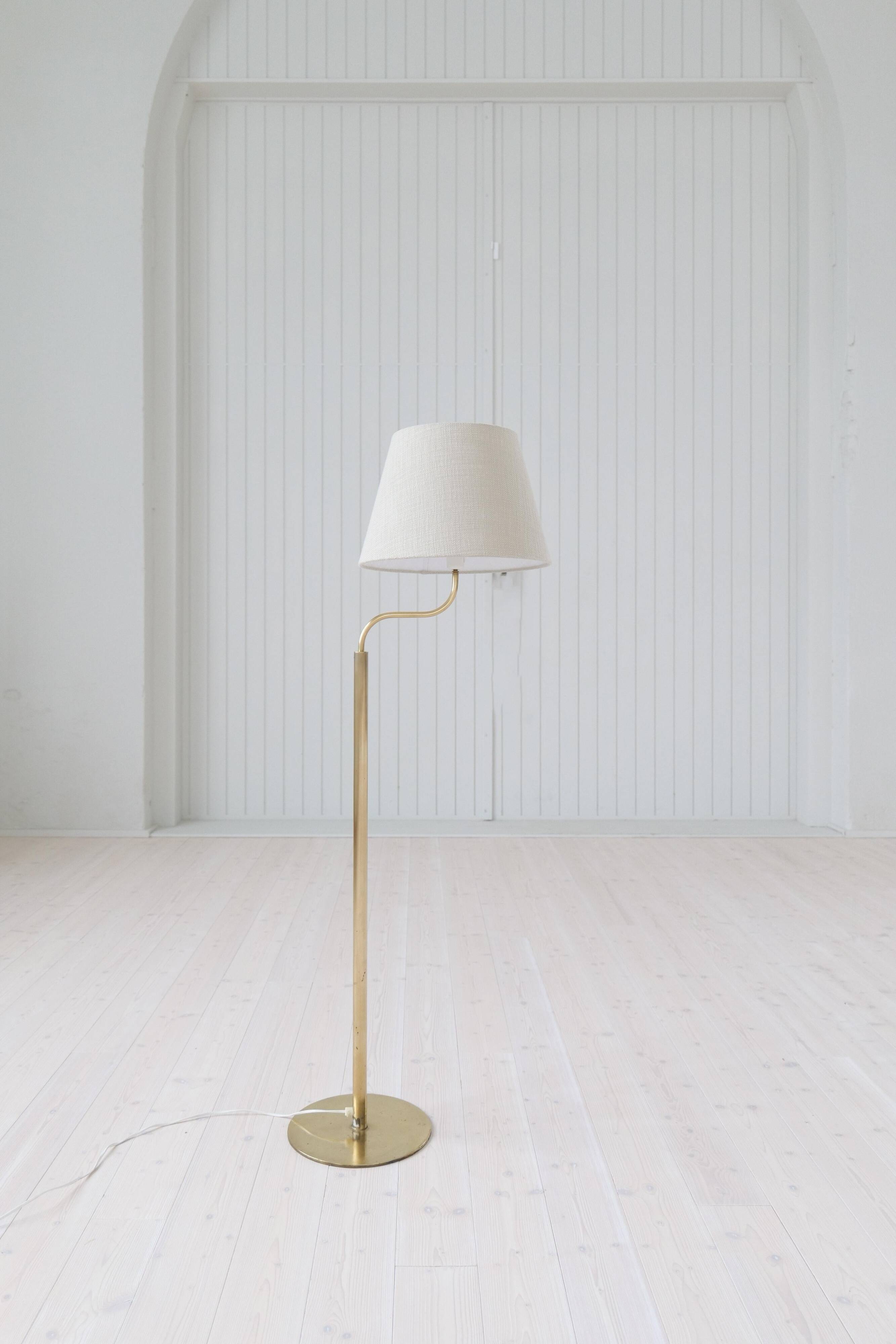 Sculptural modern brass floor lamps from the mid-century Luxus, Sweden, 1970s.