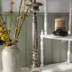 Old church candlestick in silver-plated metal