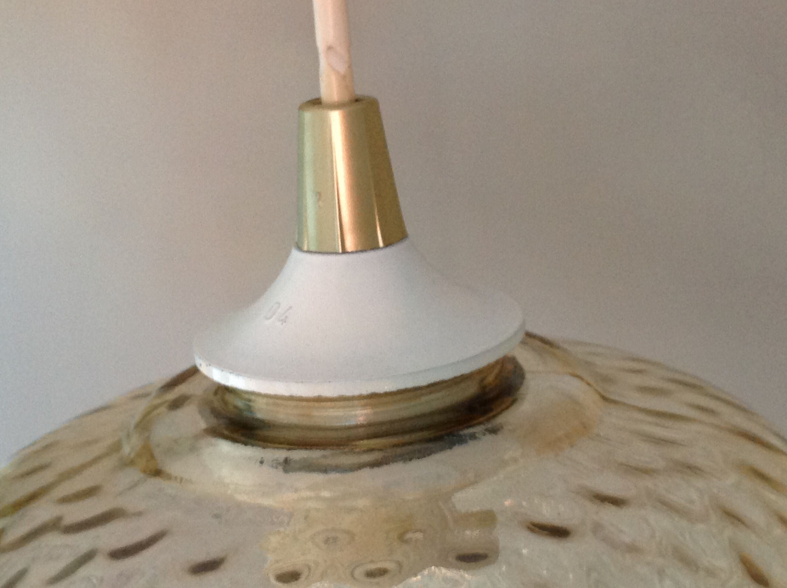 Globe pendant lamp in bubbled amber glass / vintage 60s-70s