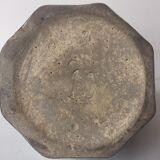 Ancient amphora vase in sand