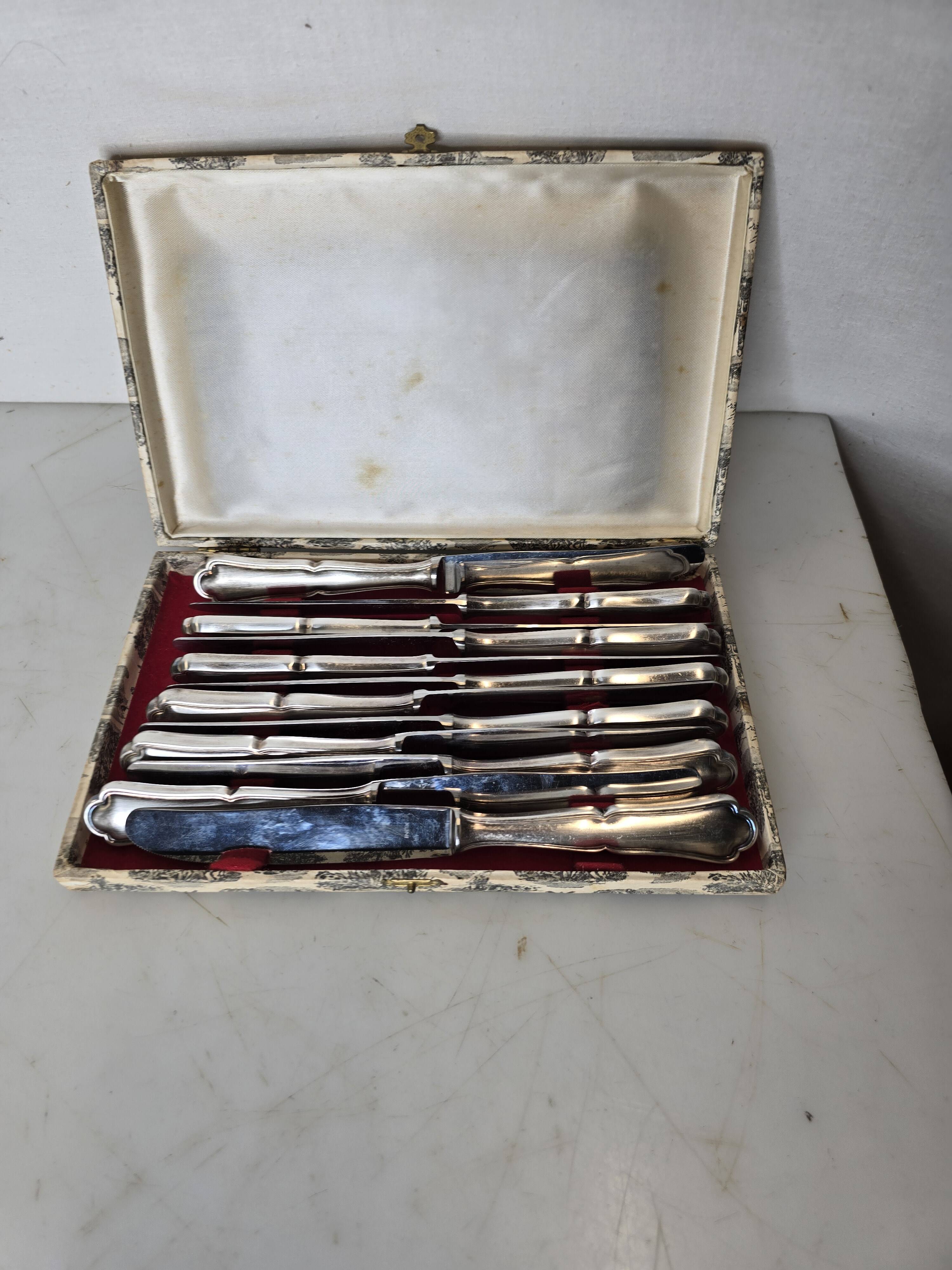 12 silver-plated knives mid-15th century
