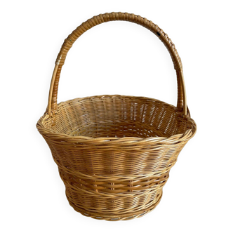 Wicker basket with wooden background