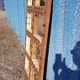 Old Burmese teak mirror with copper fittings