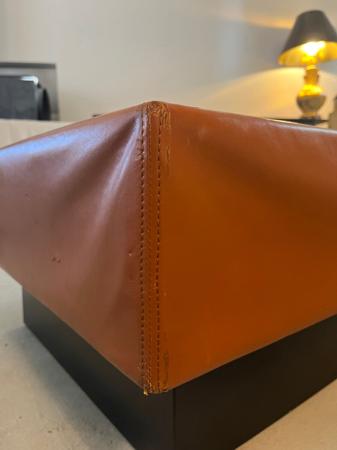 Caramel leather and black glass coffee table